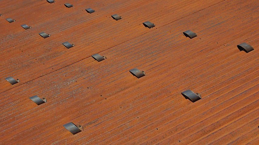 CorGard Snow Guards on Rusty Corrugated Metal Panels - 8
