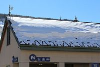 ST-18 Snow Guards on Colorado Ski Museum with snow accumulation